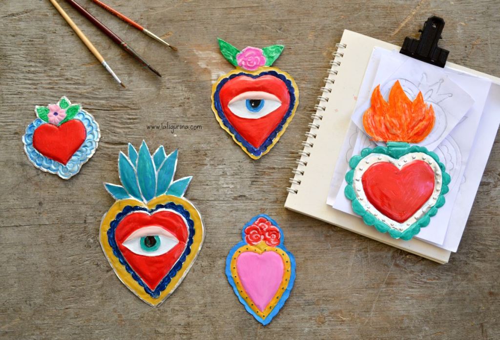 cuori votivi realizzati con il riciclo creativo di lattine